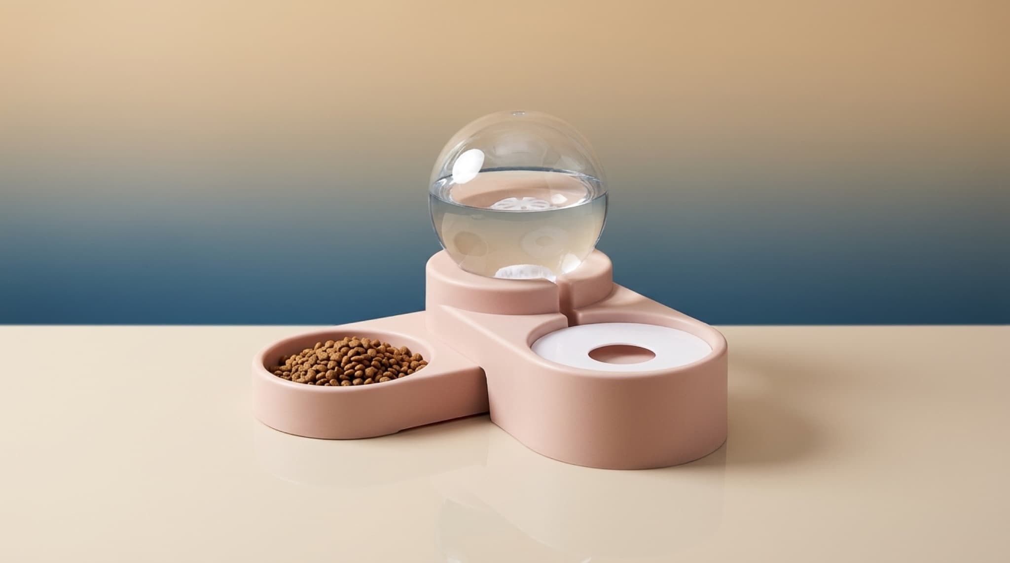 Blush pink automatic pet water fountain with clear 3.2L bubble reservoir and attached kibble bowl on a cream studio surface